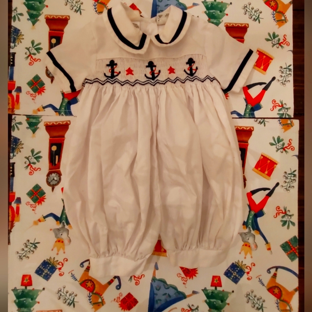 Sarah Louise England Smocked Onsie
